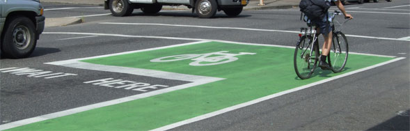 Portland bicycle lane and green bike box indicating a dangerous intersection.