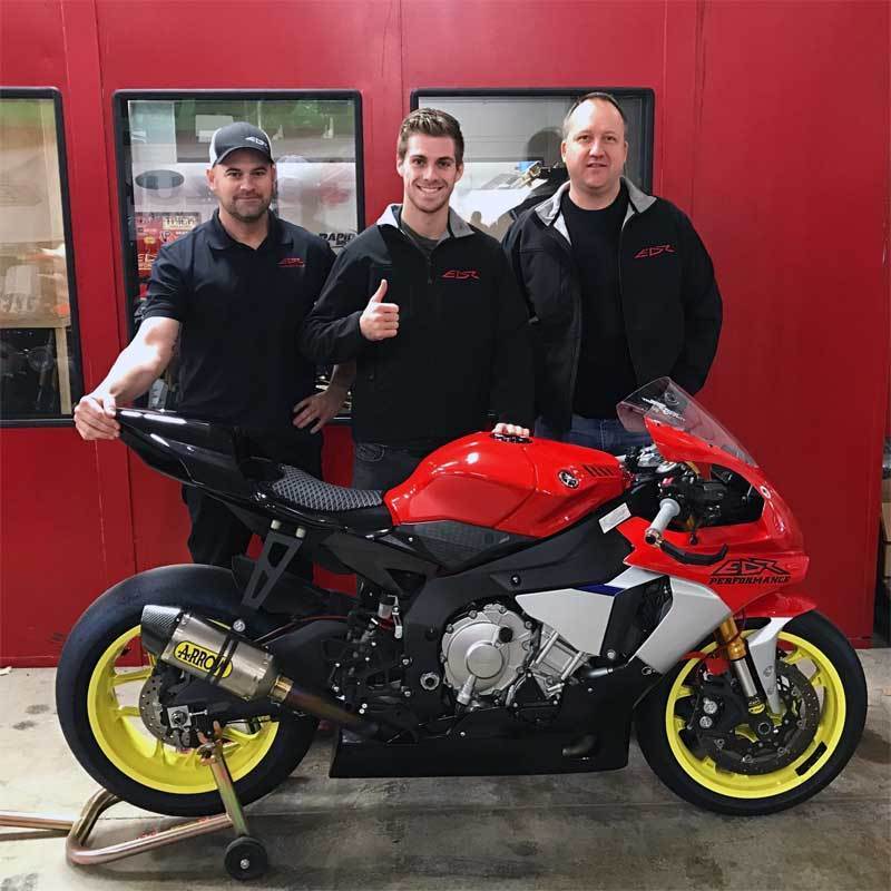Mike Colbach proud to sponsor Portland's Andy DiBrino pro motorcycle racing on his EDR Performance R1, Mike is pictured with Andy and Erid Dorn the EDR in the motorcycles
